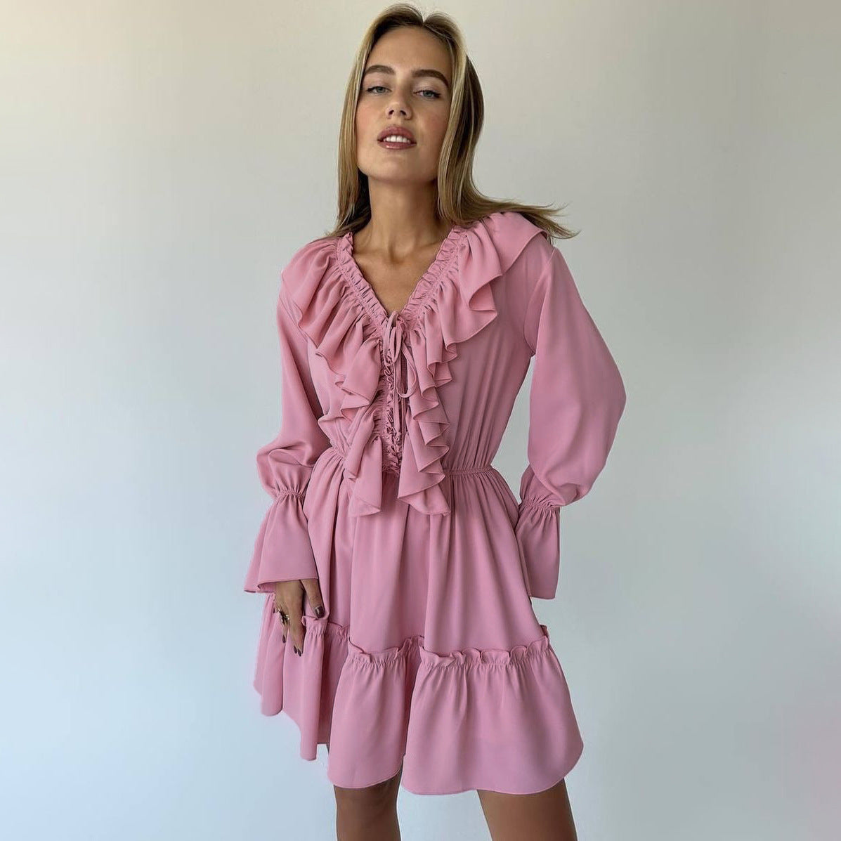 Pleated long-sleeved dress with V-neck